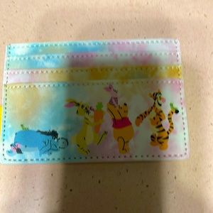 Winnie the Pooh credit card holder 4 slots and opens in the middle